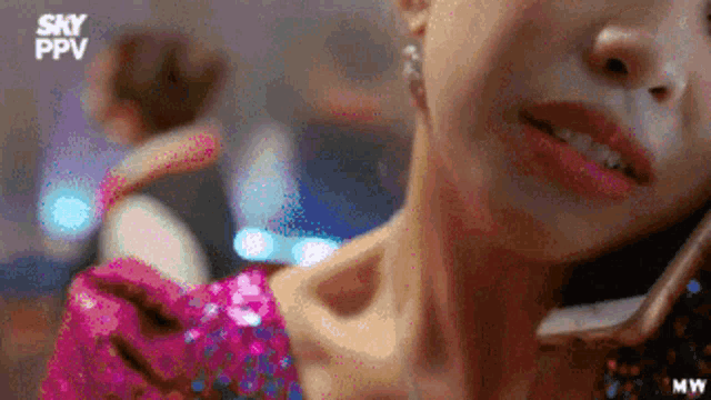 a close up of a woman 's neck with the words sky ppv on the bottom