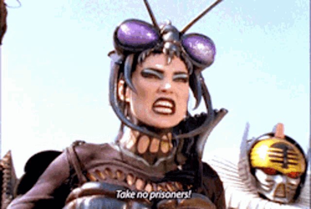 a woman in a bug costume is saying take no prisoners