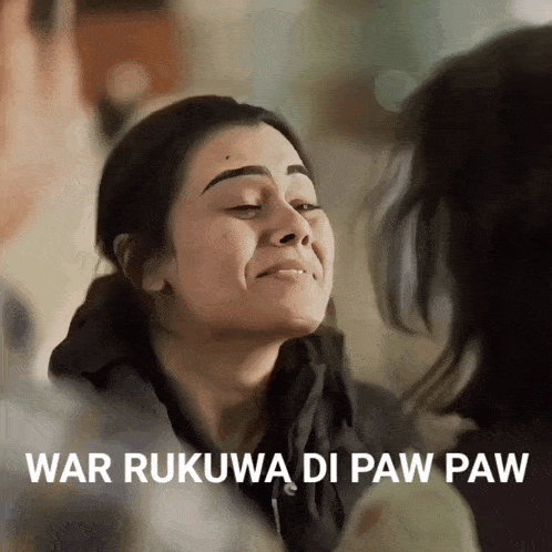 a woman with her eyes closed and the words war rukuwa di paw paw behind her