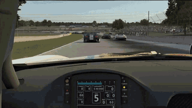 a video game screen shows a race with the number 5 on it