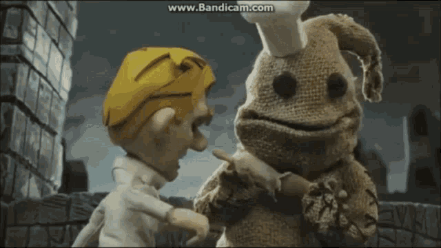a cartoon character with a chef 's hat is talking to another character