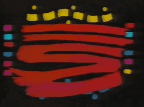 a colorful sbt logo with a black circle in the center