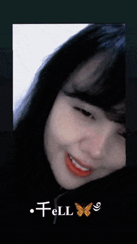 a close up of a woman 's face with the words fell written below her