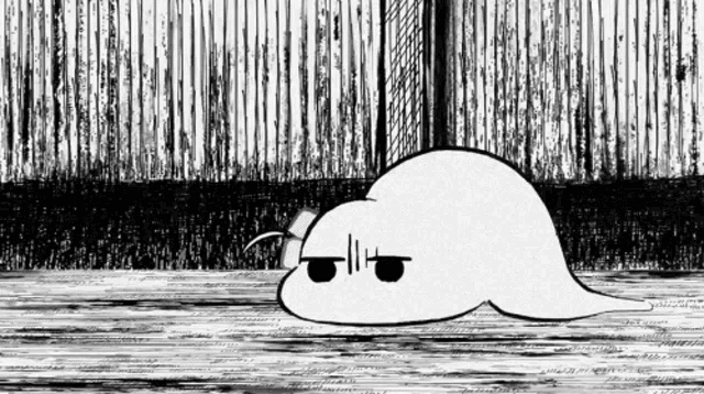 a black and white drawing of a seal wearing sunglasses laying on the floor .