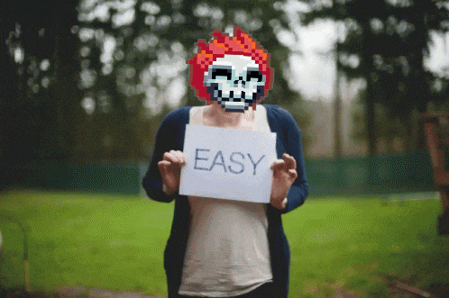 a woman holding a sign that says easy in front of a pixelated skull