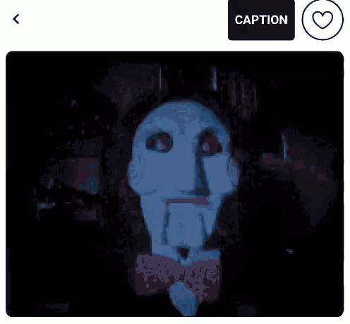 a picture of a blue background with a caption button and a heart icon .