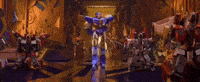 a blurry picture of a group of robots in a room .