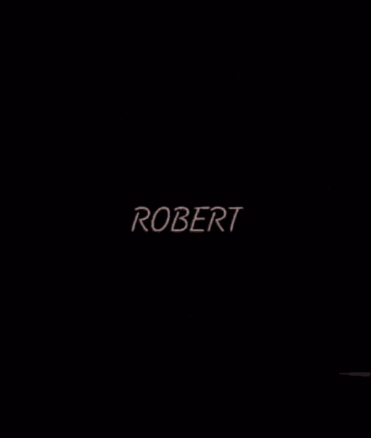 a pink heart with the name robert written on it