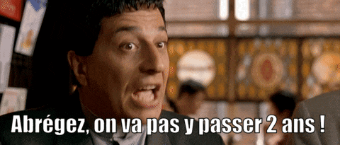 a man in a suit and tie is making a funny face with the words abregez on va pas y passer 2 ans below him