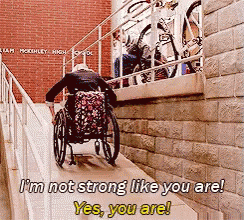 a man in a wheelchair is going down a ramp and says i 'm not strong like you are yes you are