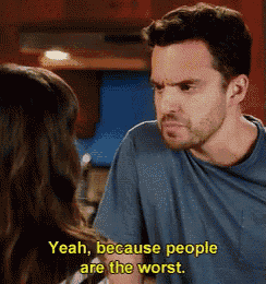 a man in a blue shirt is talking to a woman and says " yeah because people are the worst "