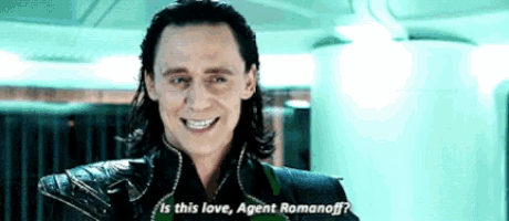 a man with long hair is smiling and says " is this love agent romanoff ? "