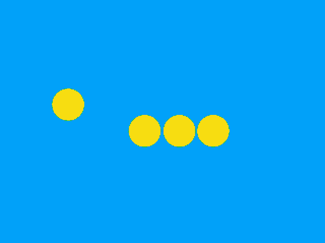 an orange circle with three purple circles on it