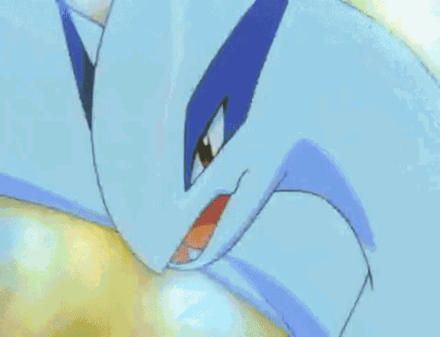 a close up of a cartoon character 's face with a blue eye and a red nose .