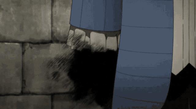 a close up of a person 's feet with a black shadow on the ground