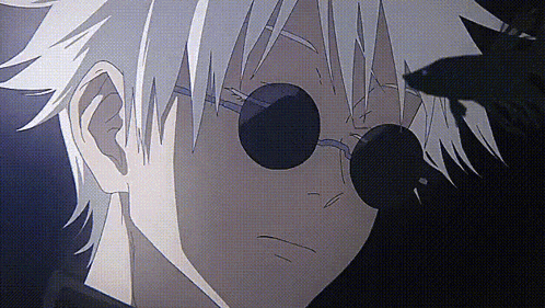 a close up of a person wearing sunglasses and a black shirt .