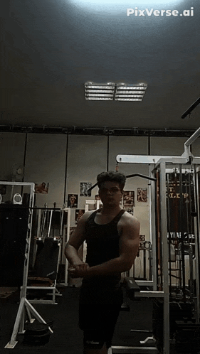 a man stands in a gym with pixverse.ai written on the bottom