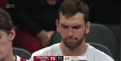 a basketball game is being played between oklahoma and texas and the score is 73 to 69