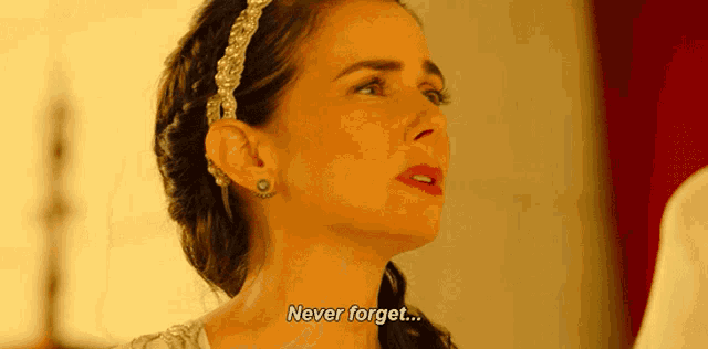 a woman says " never forget " in a close up