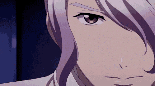 a close up of a person with purple hair