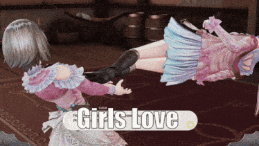 a girl in a pink dress is holding another girl in a pink dress