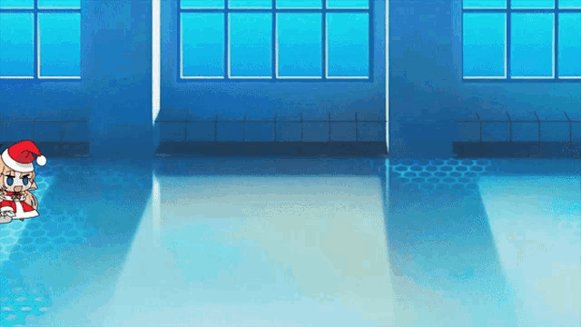 a cartoon character wearing a santa hat is sitting on a blue floor