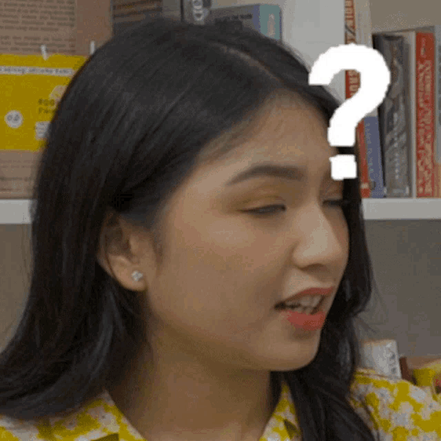 a woman with a question mark on her head