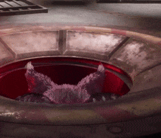 a rabbit is laying in the middle of a circular hole