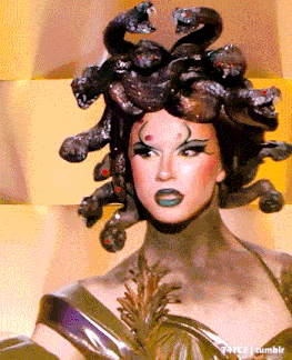 a woman in a medusa costume with snakes on her hair