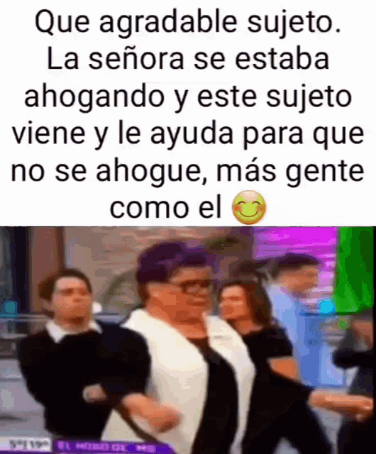 a woman with glasses is dancing in front of a group of people and says que agradable sujeto