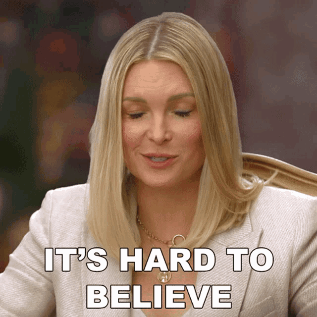 a woman says it 's hard to believe while looking down