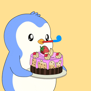 a penguin blows out a candle on a cake