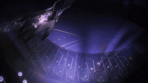 a person 's hand is reaching out towards a purple playing card table