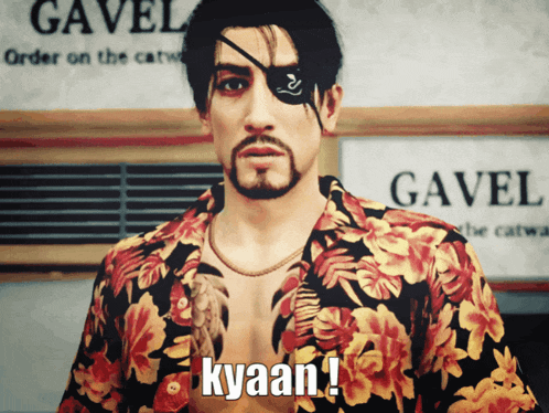 a man wearing a floral shirt says kyaan