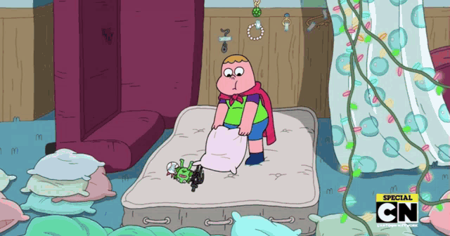 a cartoon character is laying on a mattress with a special cn logo behind him