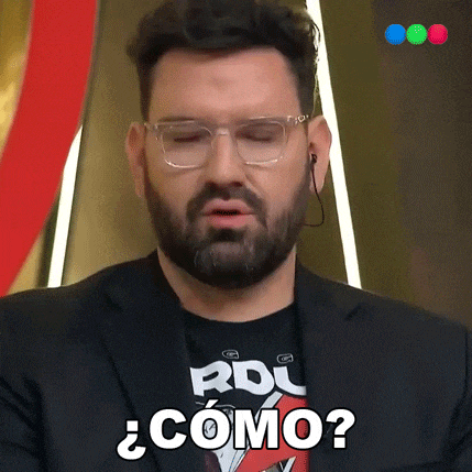 a man with glasses and a beard is wearing a black shirt that says rdc