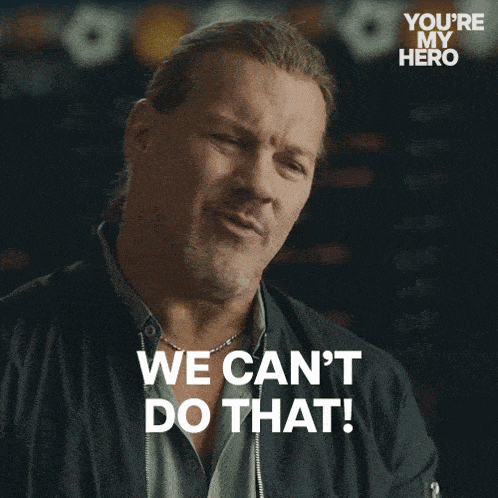a man says " we can 't do that " in front of a blackboard