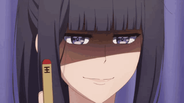 a close up of a girl 's face with the letter h on her hair