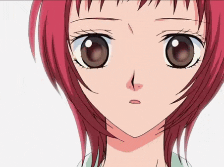 a close up of a girl with red hair