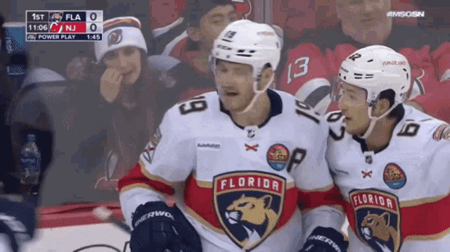 a hockey game between the florida panthers and the new jersey devils is being played