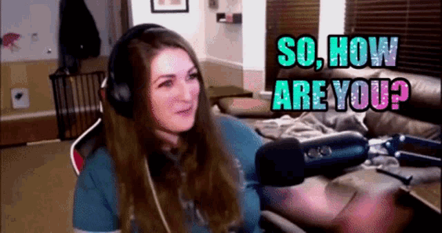 a woman wearing headphones is sitting in front of a microphone with the words so how are you behind her