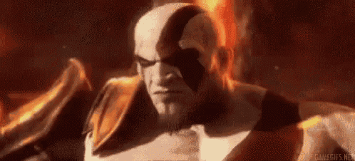 a man with red hair is standing in a dark room with a sword in his hand .