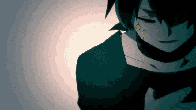 a close up of a person 's face with a tear coming out of his eye