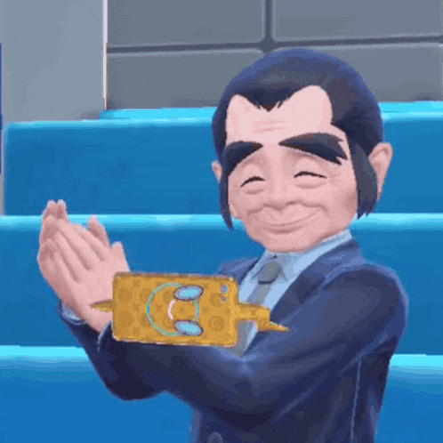 a man in a suit and tie is clapping and holding something