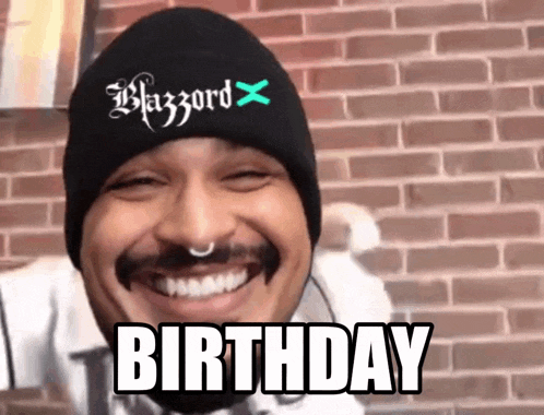 a man wearing a black beanie says birthday