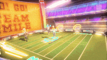 a football game is being played in a stadium with a sign that says go team mile