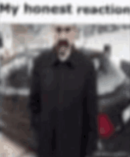 a blurry picture of a man standing in front of a car with the caption `` my honest reaction '' .