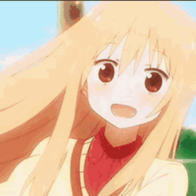 a girl with long blonde hair and brown eyes is wearing a red shirt and a yellow jacket .