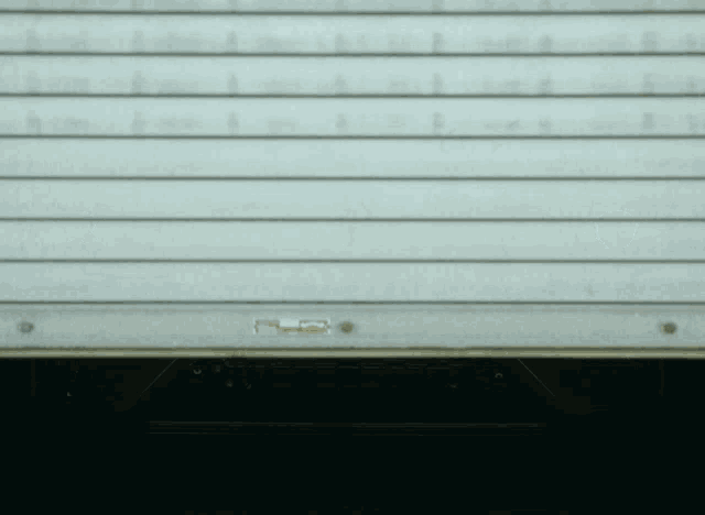 a close up of a door with a sticker on it that says ' a '