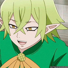 a close up of a cartoon character with green hair